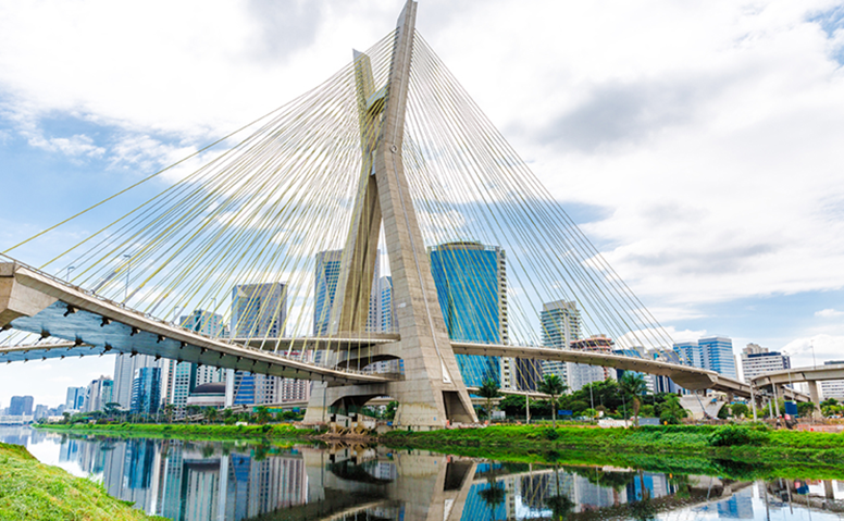Brazil: View of the Ponte Octavio Frias de Oliveira bridge that crosses the Tiete River. In the background the skyline of Sao Paulo Brazil: View of the Ponte Octavio Frias de Oliveira bridge that crosses the Tiete River. In the background the skyline of Sao Paulo