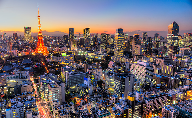 Japan: Aerial view of Tokyo at night with many brightly lit buildings Japan: Aerial view of Tokyo at night with many brightly lit buildings
